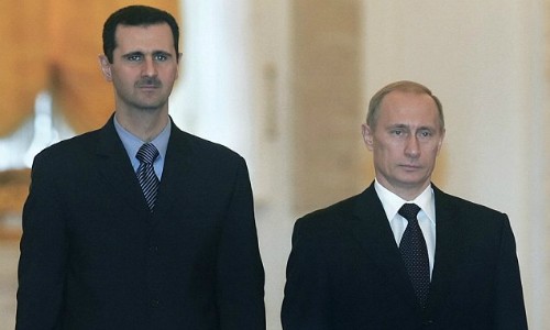 Tổng thống Nga Putin (phải) và Tổng thống Syria Assad. Ảnh: AP
