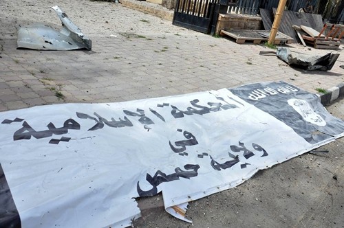 Một khẩu hiệu của tòa án Hồi giáo thuộc Nhà nước Hồi giáo ở thành phố Palmyra ngày 27/3. Ảnh: Reuters/SANA.