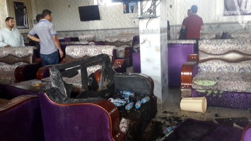Hiện trường vụ tấn công quán cà phê, nơi các cổ động viên đội bóng Real Madrid đang tụ tập ở Balad. Ảnh: Reuters