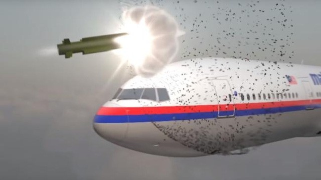 Mô phỏng thời khắc đầu đạn tên lửa phát nổ ngay gần khoang lái của máy bay MH17. (Ảnh: Dailymail)