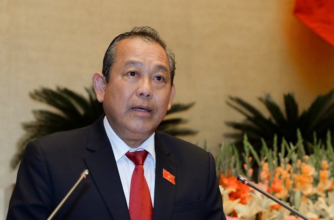 Phó Thủ tướng Trương Hòa Bình báo cáo về tình hình kinh tế, xã hội