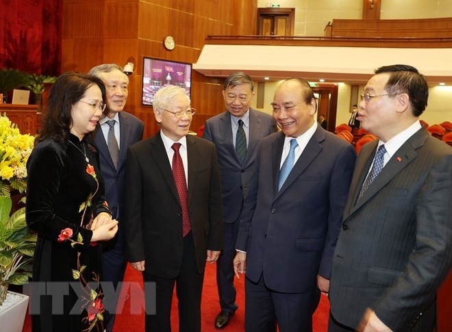 Tổng Bí thư, Chủ tịch nước Nguyễn Phú Trọng và Thủ tướng Nguyễn Xuân Phúc tại Hội nghị T.Ư 2 (ảnh TTXVN)