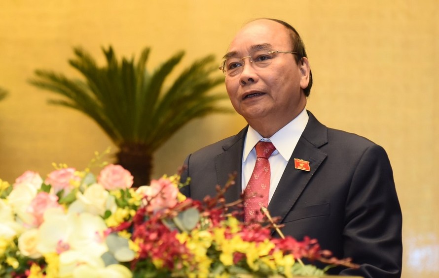 Thủ tướng Nguyễn Xuân Phúc báo cáo tại Quốc hội (ảnh Nhật Minh)