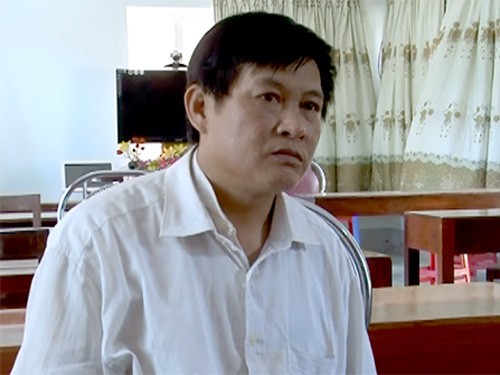 Nghi can Đàm Quang Trung bị bắt quả tang khi đang vận chuyển 8 bánh heroin cùng đồng phạm - Ảnh: VNE