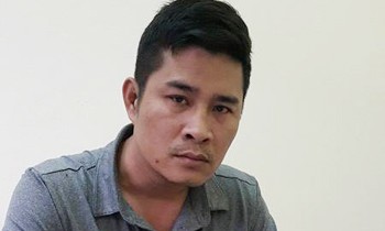 Phan Quốc Mạnh (36 tuổi) tại cơ quan điều tra. Ảnh: Hải Bình