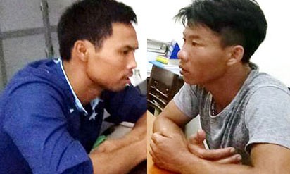 Lê Quốc Khánh (áo xanh) và Nguyễn Đình Sơn tại cơ quan điều tra