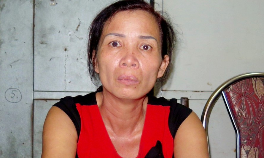 Hoàng Thị Thu, người đàn bà bị cáo buộc đã bắt cóc con riêng của nhân tình dọa cùng chết tại cơ quan công an. Ảnh: Công an Nhân dân