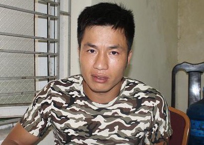 Nghi phạm Nguyễn Văn Hùng sau khi bị bắt