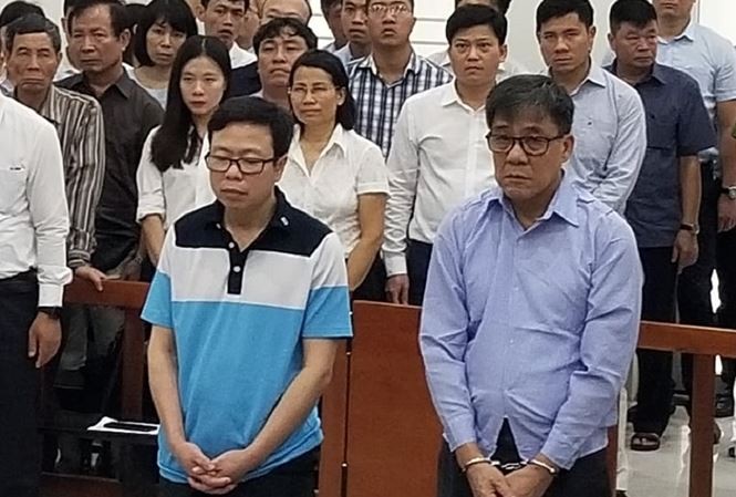 Các bị cáo Nguyễn Tuấn Hùng và Đỗ Văn Khạnh. 
