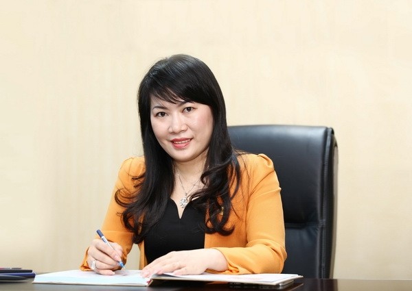 bà Lương Thị Cẩm Tú vừa được bổ nhiệm giữ chức Chủ tịch Hội đồng quản trị ngân hàng Eximbank