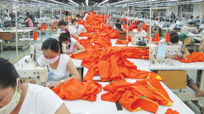 Mức thưởng tết năm nay của các công ty dệt may trên địa bàn Bình Dương từ 2,5 triệu đồng/người trở lên. ảnh: Huy Thịnh