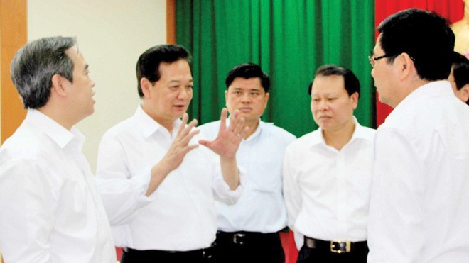 Thủ tướng Nguyễn Tấn Dũng với các đại biểu tại hội nghị. Ảnh: QUỐC TRUNG