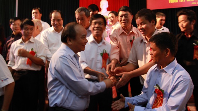 Phó Thủ tướng Nguyễn Xuân Phúc với các đại biểu tại Hội nghị. Ảnh: T.D