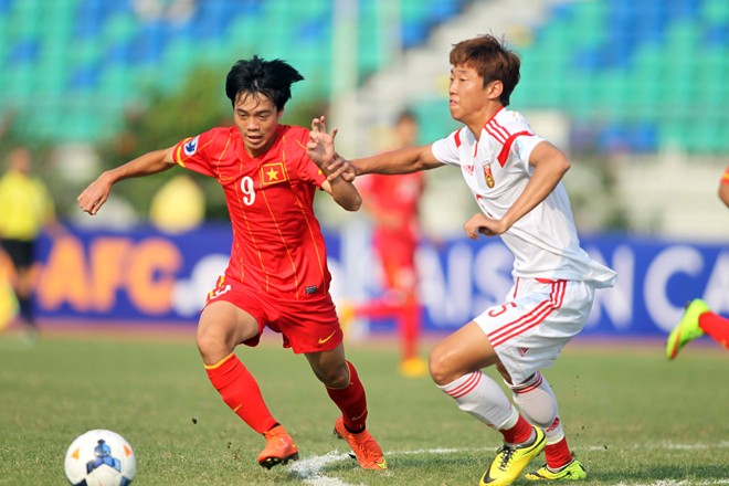 U19 Việt Nam (trái) có trận đấu hay trước U19 Trung Quốc song đáng tiếc lại đánh rơi chiến thắng phút cuối. Ảnh: VSI 