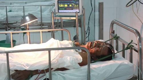 Bệnh nhân T.Q.Đ đang điều trị tại phòng hồi sức Bệnh viện đa khoa Tây Ninh - Ảnh: Giang Phương