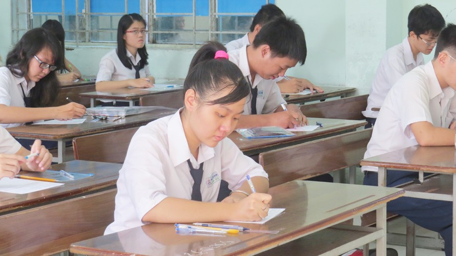 Học sinh làm bài thi tốt nghiệp 2014 ở TPHCM. Ảnh: Nguyễn Dũng