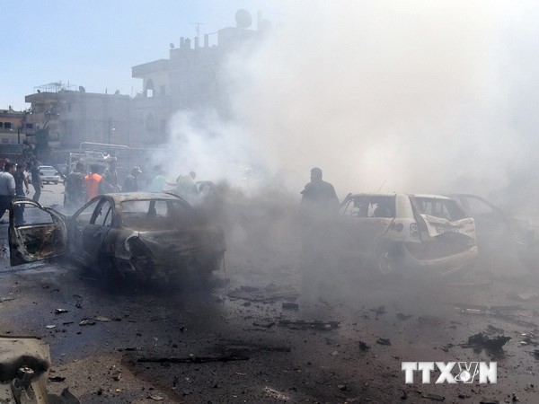 Hiện trường một vụ đánh bom ở Homs. (Nguồn: AFP/TTXVN) 