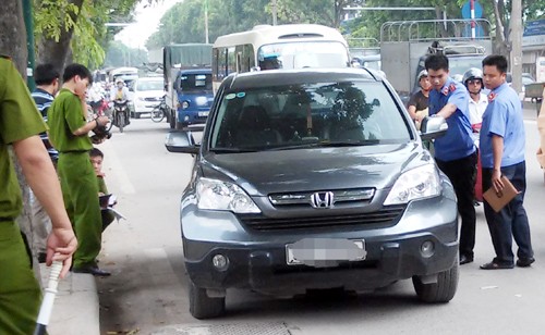 Hiện trường vụ giết người trên phố Phạm Văn Đồng vào ngày 5/8/2014. 