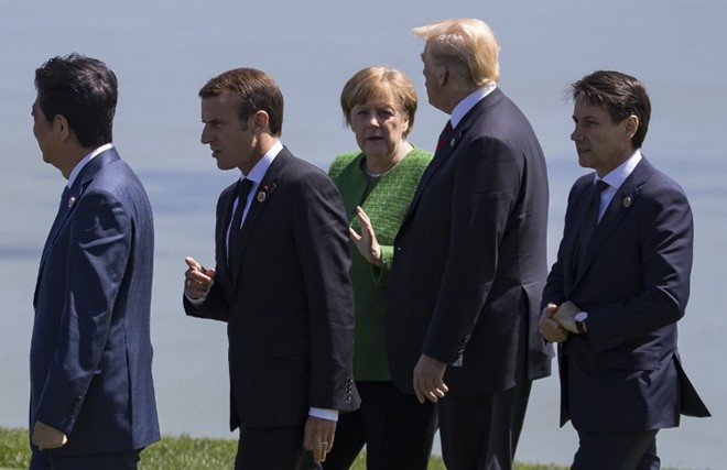 Các lãnh đạo G7 trước khi bước vào hội đàm chính thức hôm 8/6. Ảnh: AFP.