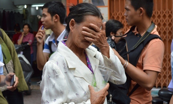 Nạn nhân chết cháy ở Sài Gòn vẫn ôm bọc tiền