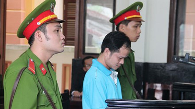 Võ Văn Minh tại phiên tòa sơ thẩm. Ảnh: Tân Châu