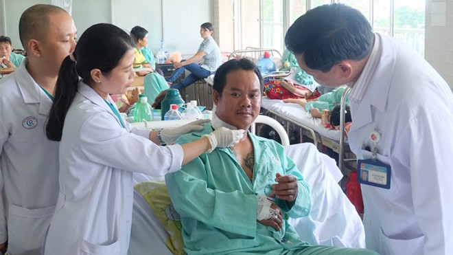 Bệnh nhân Phạm Văn Quang tại Bệnh viện Chợ Rẫy TPHCM sáng 18/7. Ảnh: Quốc Ngọc 