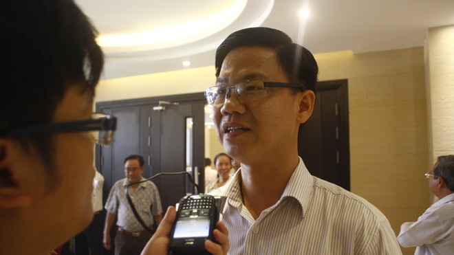 Ông Trần Văn Hưng trả lời phỏng vấn bên lề hội thảo