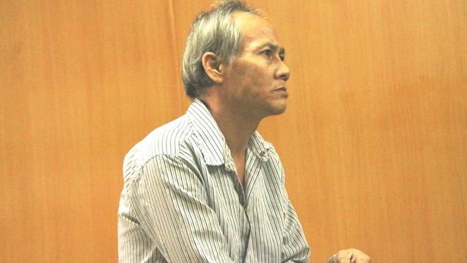 Tú ông Nguyễn Quang Nhựt tại tòa sáng nay 29/11. Ảnh: Tân Châu
