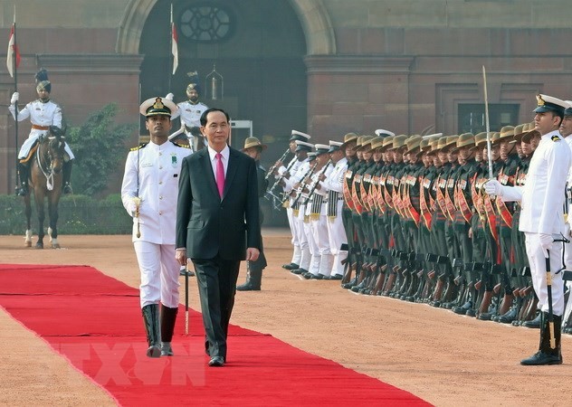 Chủ tịch nước Trần Đại Quang duyệt đội danh dự. (Ảnh: Nhan Sáng/TTXVN)