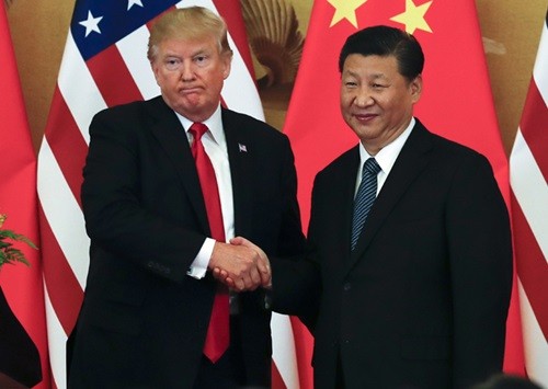 Tổng thống Mỹ Donald Trump (trái) và Chủ tịch Trung Quốc Tập Cận Bình gặp nhau tại Bắc Kinh tháng 11/2017. Ảnh: AP.