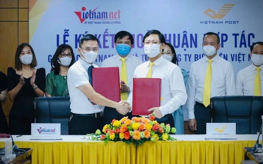 Lễ ký thỏa thuận hợp tác giữa Tổng Công ty Bưu điện Việt Nam (Vietnam Post) và Báo VietNamNet