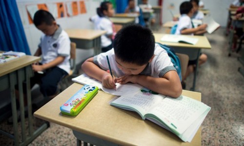 Học sinh trong một lớp học ở Trung Quốc. Ảnh minh họa: AFP.