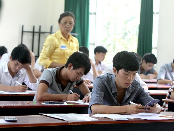 Thí sinh thi môn Toán (khối B) tại Hội đồng thi Trường Đại học Nông Lâm Thành phố Hồ Chí Minh, năm 2013. (Ảnh: Phương Vy/TTXVN)
