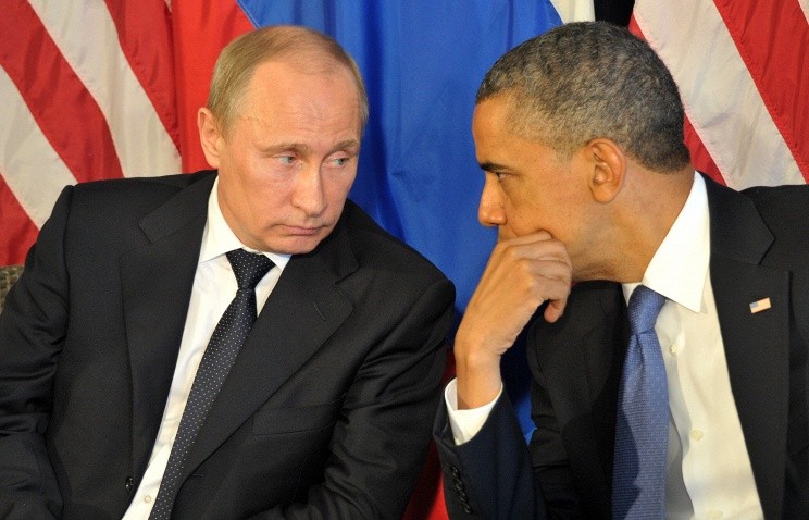 Tổng thống Nga (trái) và Tổng thống Mỹ mong muốn sớm chấm dứt khủng hoảng tại Ukraine