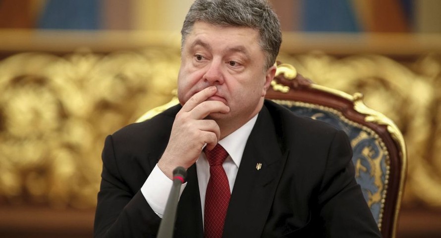 Tổng thống Ukraine Petro Poroshenko khẳng định không có tiếng súng trong suốt tuần qua ở miền Đông Nam nước này. Ảnh: Reuters