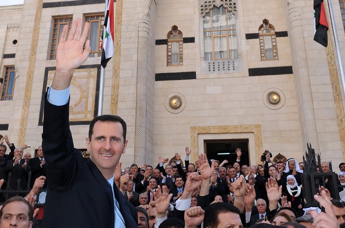Tổng thống Syria Bashar al-Assad cam kết sẽ giành lại toàn bộ đất nước. Ảnh: Aljazeera