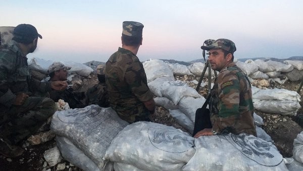 Quân đội Syria tại một căn cứ gần biên giới Thổ Nhĩ Kỳ. Ảnh: RIA Novosti