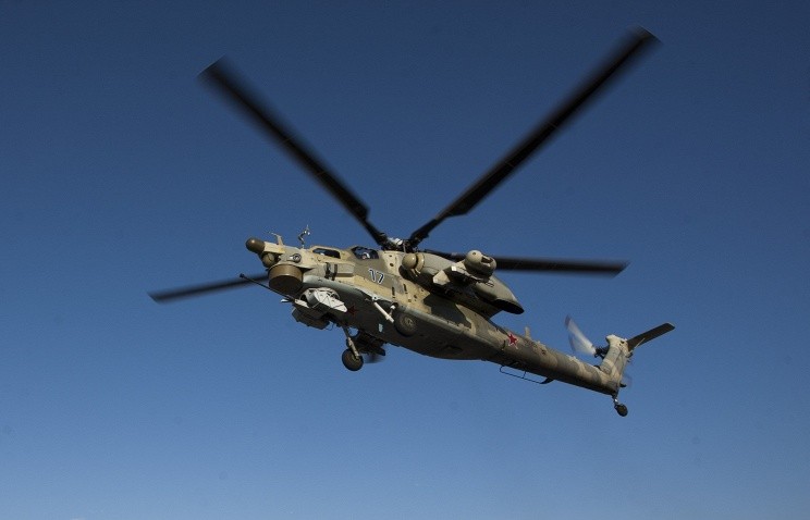 Trực thăng tấn công Mi-18N của không quân Nga. Ảnh: Tass
