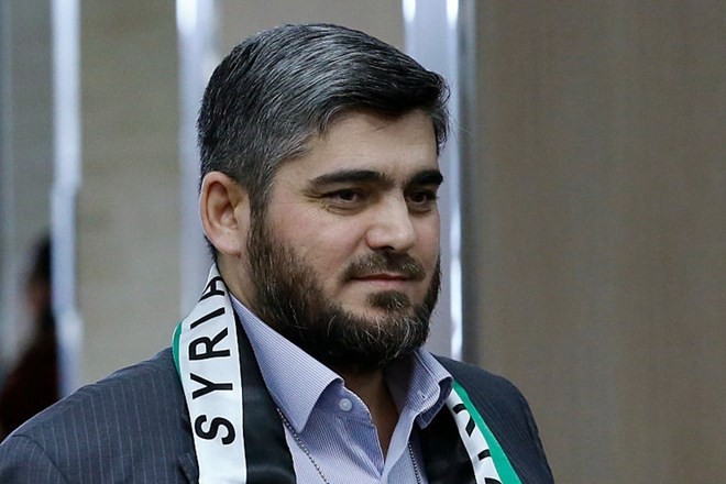 Nhà thương thuyết cấp cao của phe đối lập Syria Mohammed Alloush. Ảnh: Reuters