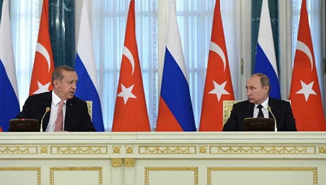Tổng thống Nga - Thổ Nhĩ Kỳ bắt tay ở Syria là "cái tát vào mặt" Mỹ và EU. Ảnh: RIA Novosti