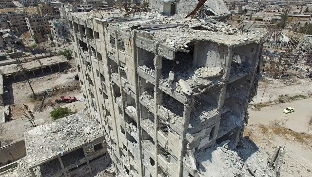 Xung đột tàn phá Syria. Ảnh: RIA Novosti