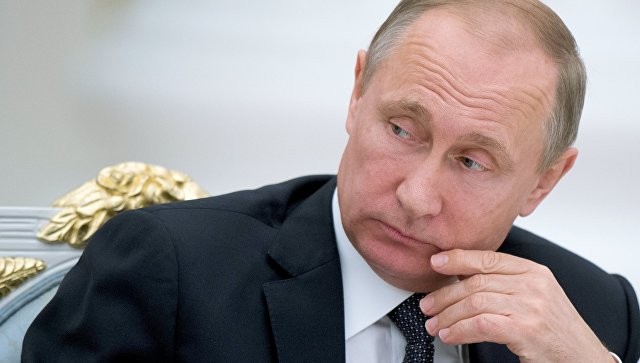 Tổng thống Nga Vladimir Putin vừa ký sắc lệnh sa thải tám tướng. Ảnh: RIA Novosti