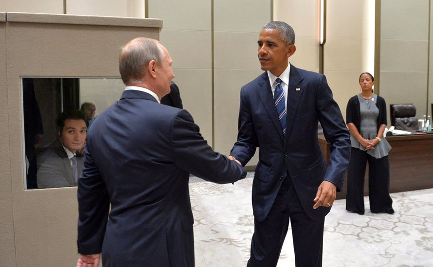 Tổng thống Nga Putin (trái) và người đồng cấp Mỹ Obama vừa có cuộc gặp kéo dài hơn 1 giờ đồng hồ tại Hàng Châu, Trung Quốc. Ảnh: Tân Hoa Xã