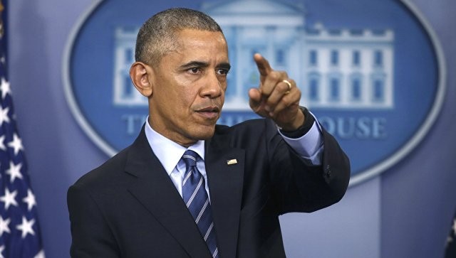 Trước khi rời Nhà Trắng, ông Obama ký đạo luật làm khó quan hệ Mỹ - Nga. Ảnh: Reuters