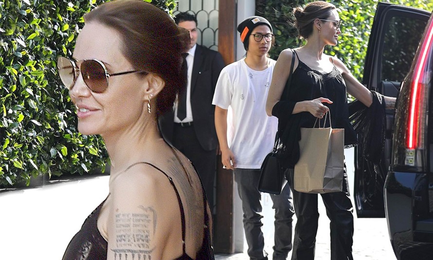 Angelina Jolie mặc áo 2 dây trẻ trung, khoe loạt hình xăm ở lưng