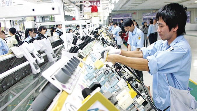 Theo các chuyên gia, doanh nghiệp Việt Nam vẫn “hụt” về tiếp cận công nghệ cao. Ảnh: Hồng Vĩnh.