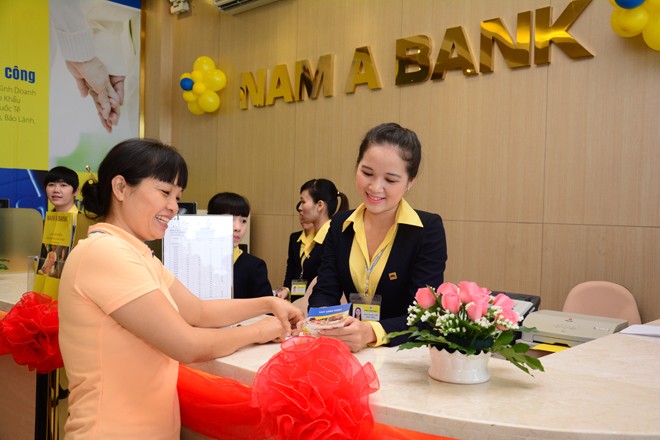 NamABank sẽ trở thành ngân hàng đầu tiên sáp nhập trong năm 2015.
