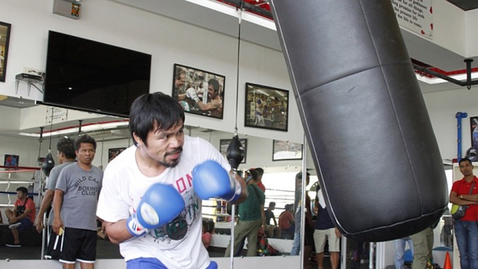 Manny Pacquiao tập luyện cho trận thượng đài với Floyd Mayweather vào ngày 2/5 tới. Ảnh: Getty Images.
