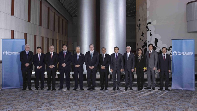 Trưởng đoàn các nước tham gia đàm phán TPP chụp ảnh chung tại hội nghị ở Atlanta. Ảnh: TTXVN.