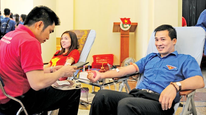 Anh Vũ Minh Lý, Giám đốc Trung tâm Tình nguyện Quốc gia hiến máu tại Ngày hội. Ảnh: Xuân Tùng.